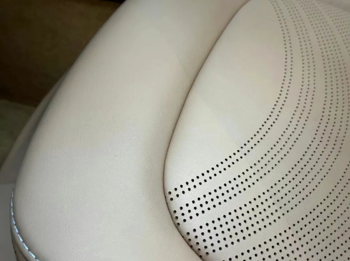 How can you safely clean and maintain perforated genuine leather seats?-Nleather